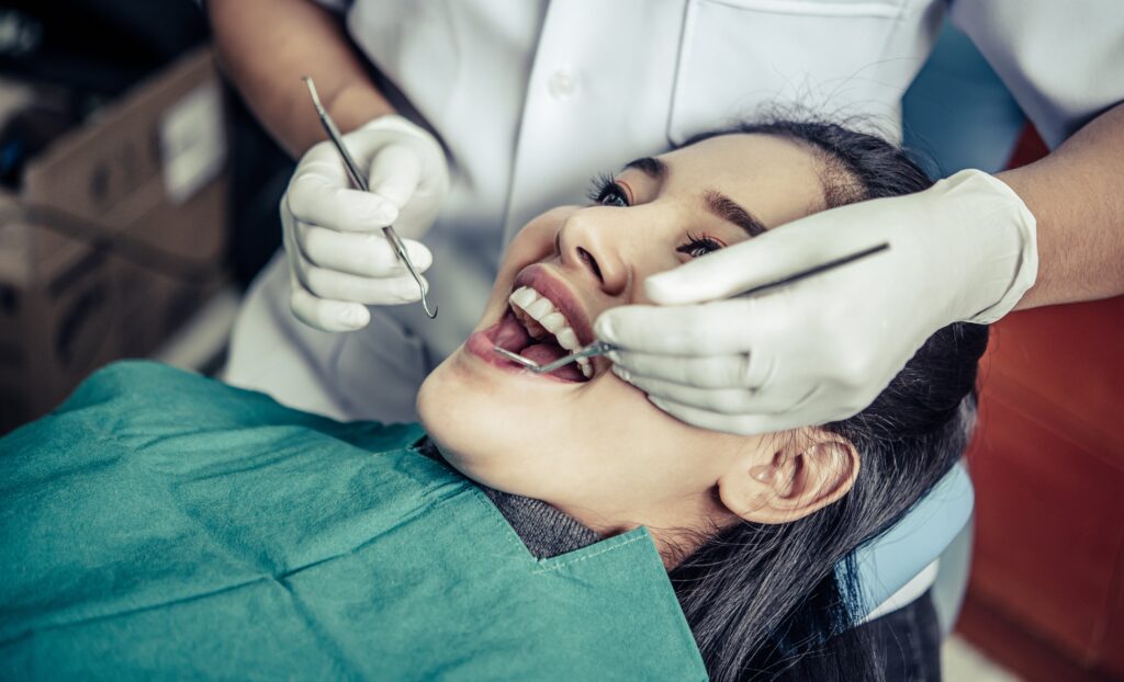 dentists-treat-patients-teeth