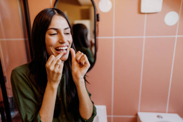 Young woman taking care of her dental health